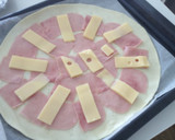 Foto del paso 4 de la receta: Hojaldre de jamón, emmental, queso de cabra y tomates cherry