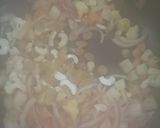 A picture of step 6 of Chirer Polao/ Beaten rice Pulao.