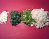 Foto del paso 2 de la receta Alubias blancas con tomate, ajo y perejil