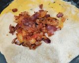 A picture of step 4 of Sattu Paratha with onion.