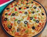 A picture of step 5 of Chicken Tikka Pizza 🍕🍕.
