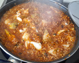 Foto del paso 5 de la receta: Paella de bacalao y alcachofas