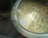 A picture of step 2 of Singaporean Rice.