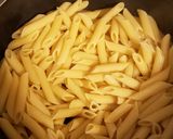 A picture of step 4 of The Beast Cheesy Garlic Penne.