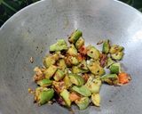 A picture of step 5 of Red Amaranth Dry Curry.