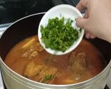 A picture of step 10 of Fish Curry.