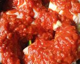 Une image de l'étape 2 de Cuisses de poulet au four sauce tomates et courgettes.