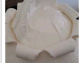 A picture of step 20 of Princess eggless cake.