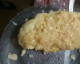 Foto del paso 4 de la receta: Papas rellenas con choclo y cebolla