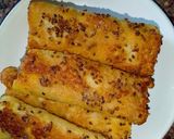 A picture of step 9 of Banana French toast roll ups with peanut sauce. #breakfastideas.