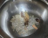 A picture of step 1 of Sweetcorn Pulao.