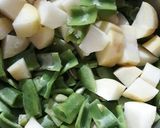 A picture of step 1 of Broad Beans(Sem) Potato Sabzi.
