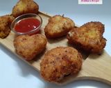 A picture of step 3 of Potato cheese bombs.