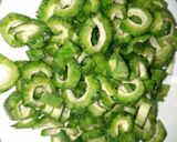 A picture of step 1 of Bitter gourd/karela stir-fry.