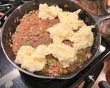 A picture of step 10 of Cheesy Shepherd's Pie.