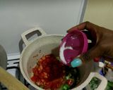 A picture of step 2 of Ugali, Eggs and Greens.