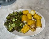 A picture of step 3 of Air fryer corn on the cob.