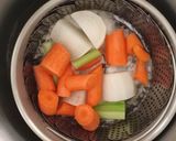 Foto del paso 2 de la receta Garbanzos guisados con crema de calabaza y yakiniku