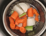 Foto del paso 2 de la receta: Garbanzos guisados con crema de calabaza y yakiniku
