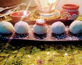 A picture of step 5 of Coconut laddu made from milk and desiccated coconut Powder.