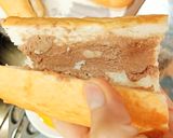 Hình bước làm 3 của món Bánh mỳ pate kẹp trứng, rau xà lách, mùi, cà chua, dưa chuột