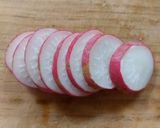 A picture of step 1 of Cucumber and Radish Salad.