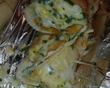Foto del paso 5 de la receta: Barra rellena de pechuga queso gratinada con ajo perejil y cuatro quesos