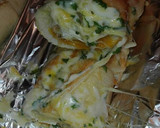 Foto del paso 5 de la receta: Barra rellena de pechuga queso gratinada con ajo perejil y cuatro quesos