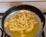 A picture of step 2 of Peyaj Koli Bhaja.