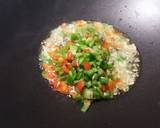 Foto del paso 15 de la receta Wok de arroz frito basmati, con costillas de cordero adobadas