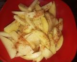 A picture of step 2 of Baked Potatoes wedges.