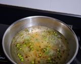 A picture of step 2 of Rice flour Khichu.