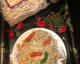 A picture of step 4 of Linguine white sauce pasta.