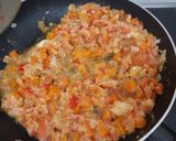 Foto del paso 5 de la receta: Calabacín relleno con pollo