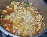 A picture of step 6 of آلو گوبھی.