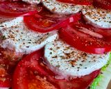 A picture of step 4 of Quick Caprese Puff Pastry Pizza with Basil Pesto by TastyPinch.