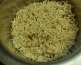 A picture of step 1 of Cheesy Maggi vegetable cake.