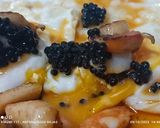 Foto del paso 8 de la receta: Huevos fritos con vieiras, langostinos y sepia