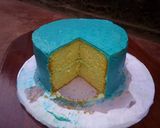 A picture of step 1 of Vanilla cake topped with buttercream.