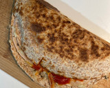 Foto del paso 3 de la receta: Tortipizza integral con pavo y queso