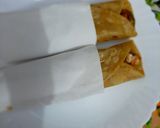 A picture of step 11 of Chicken Roll.