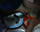 A picture of step 2 of Oreo coconut laddo.