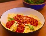 A picture of step 7 of Cheats Pea and Ricotta Ravioli with Rich Tomato Sauce.