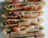 Spicy omelette stuffed 'roti' recipe step 5 photo