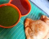 A picture of step 7 of Samosa - garma garma with the chutney.