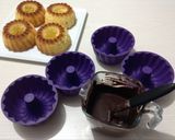 Foto del paso 4 de la receta: Mini bundt cake de naranja y chocolate