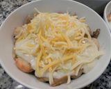 Foto del paso 8 de la receta: gambas,setas y champiñones gratinados con bechamel.
