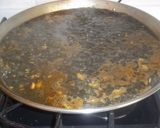 Foto del paso 6 de la receta: Paella de calamares en su tinta y sin verduras