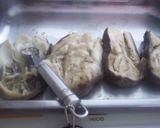 Foto del paso 4 de la receta: Berenjenas rellenas de caballa y gratinadas