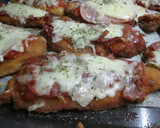 Foto del paso 10 de la receta: Milanesas con salsa de tomate, jamón y queso.